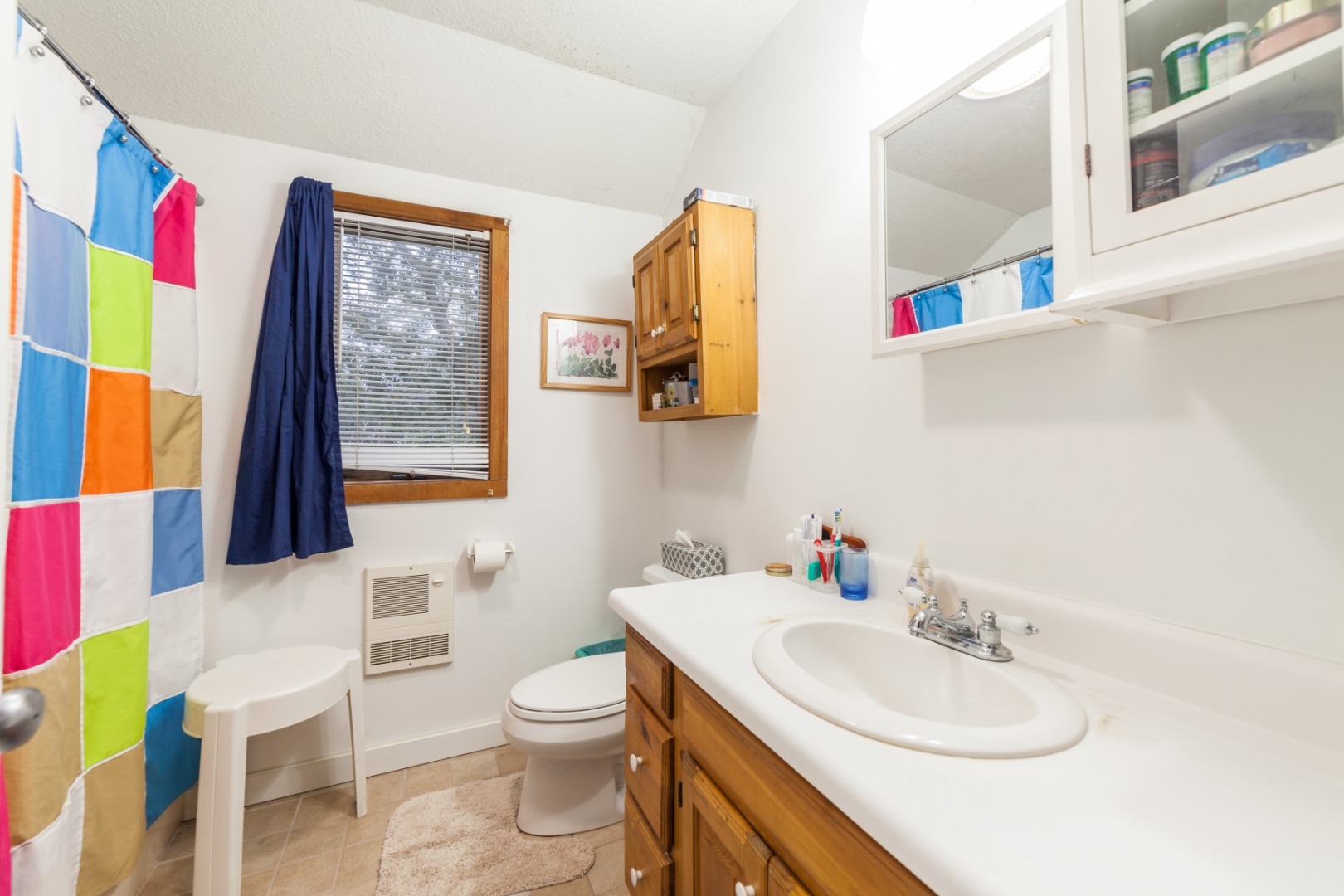 309 County Road Oak Bluffs, MA 02557 - Photo 17 of 32 a bathroom with a sink vanity mirror and toilet