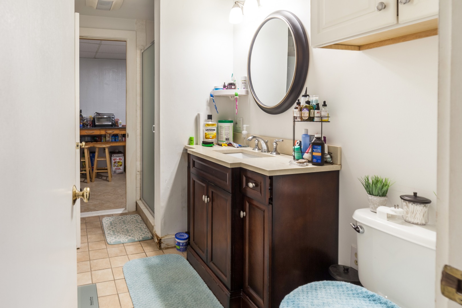 309 County Road Oak Bluffs, MA 02557 - Photo 20 of 32 a bathroom with a sink and a mirror