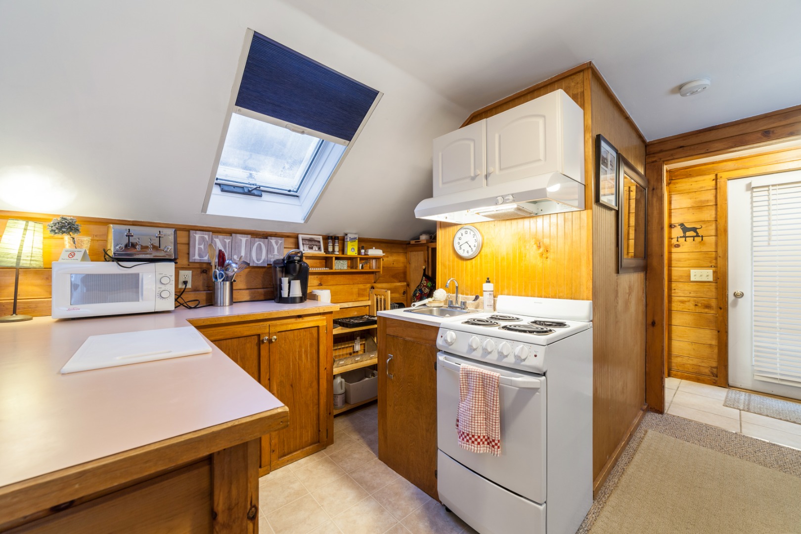 309 County Road Oak Bluffs, MA 02557 - Photo 26 of 32 a kitchen that has a stove and a table