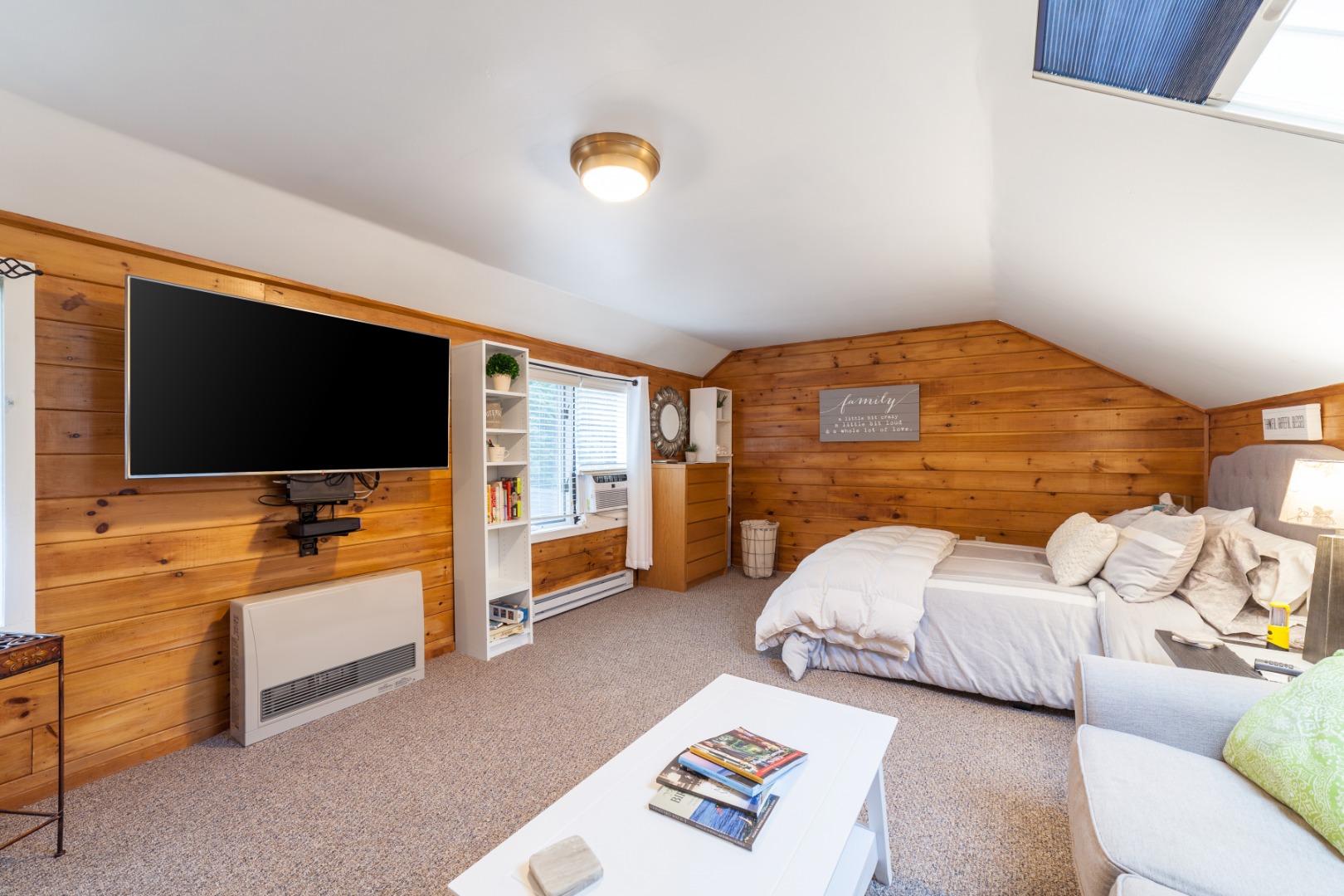 309 County Road Oak Bluffs, MA 02557 - Photo 27 of 32 a bedroom with furniture and a flat screen tv