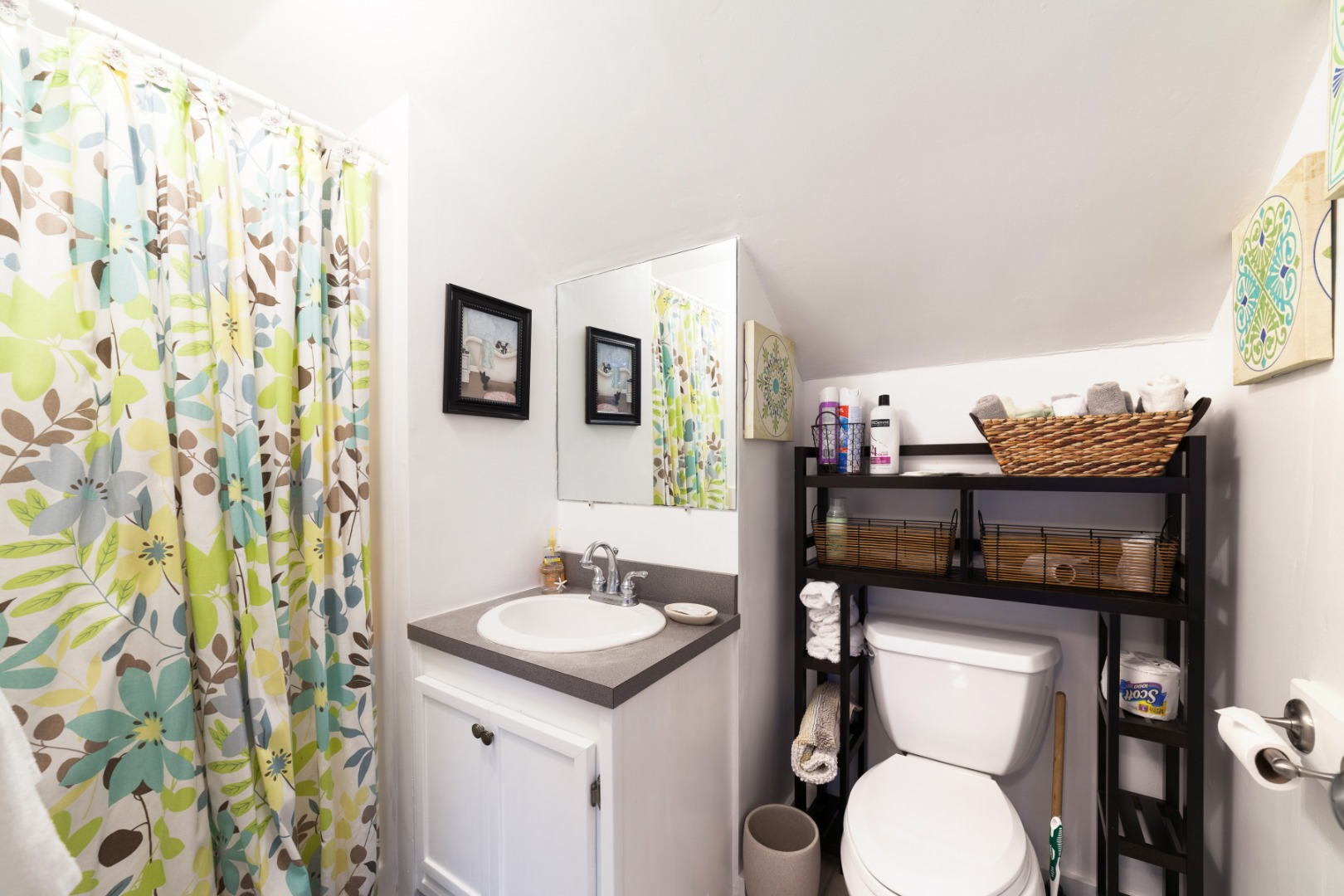 309 County Road Oak Bluffs, MA 02557 - Photo 29 of 32 a bathroom with a sink a toilet and a mirror