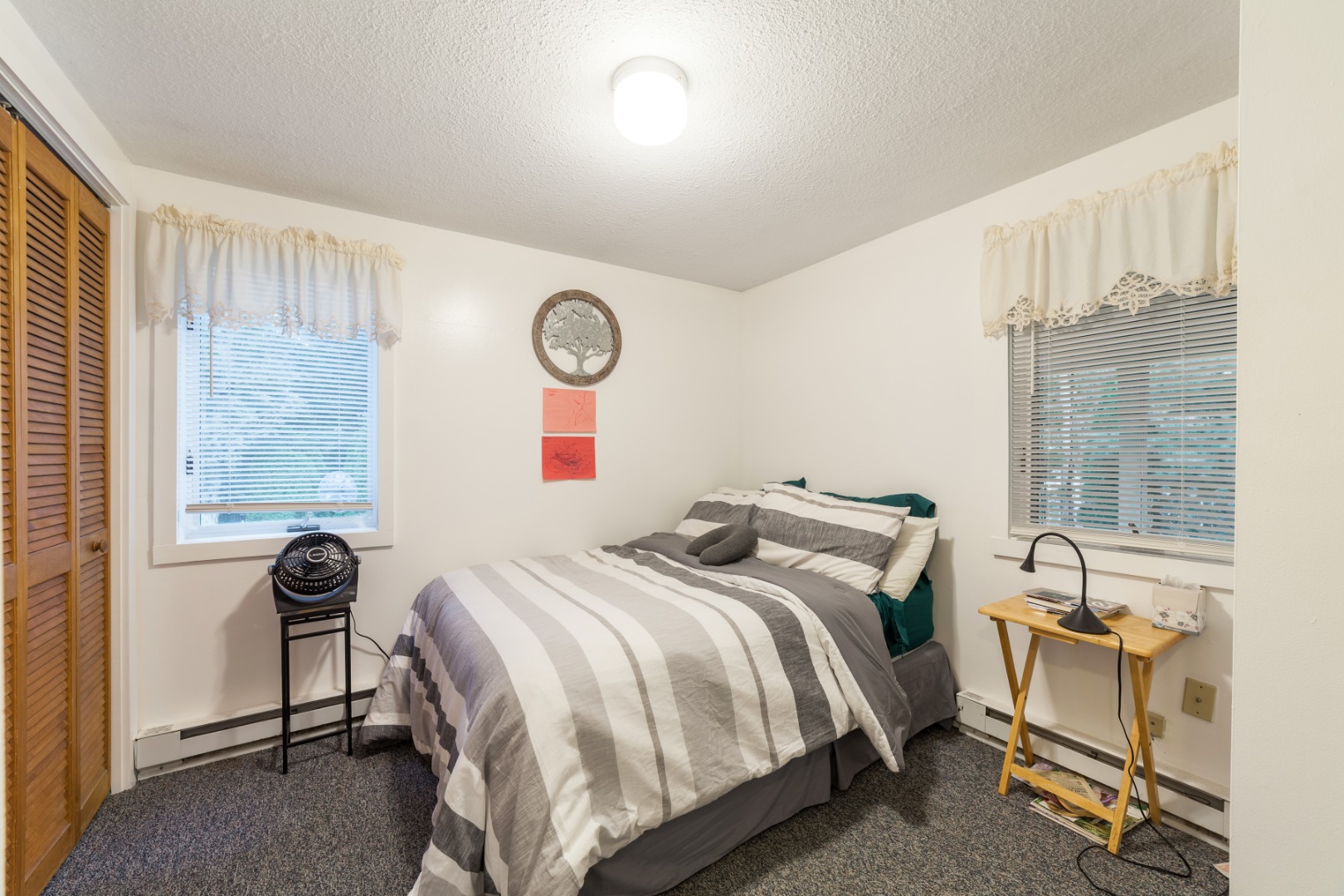 309 County Road Oak Bluffs, MA 02557 - Photo 5 of 32 a bedroom with a bed and a window