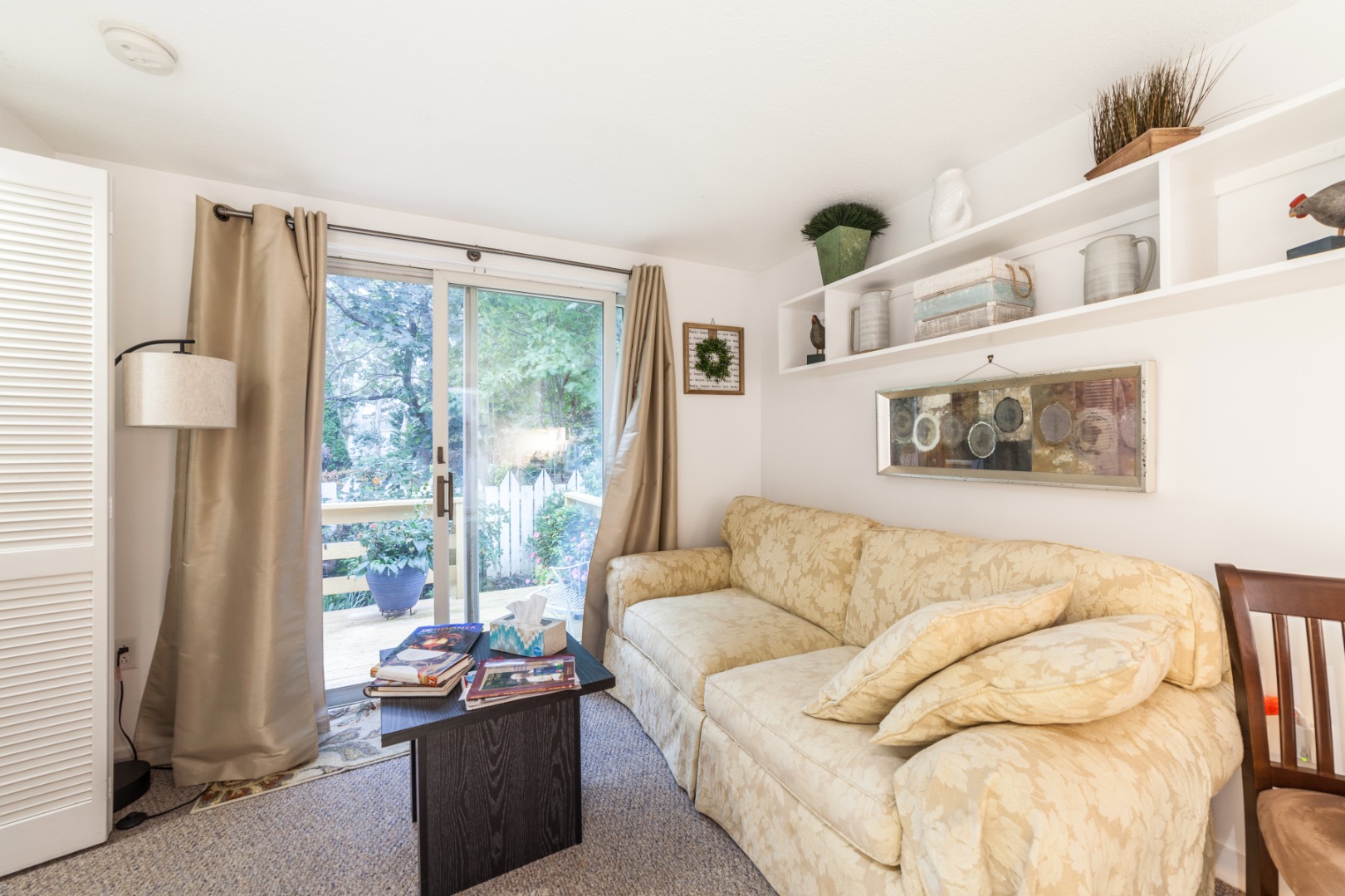 309 County Road Oak Bluffs, MA 02557 - Photo 10 of 32 a living room with furniture and a large window