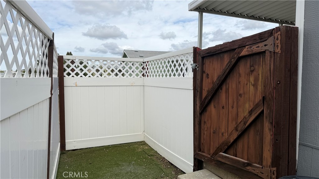 10320 Calimesa Boulevard, Unit 248 Calimesa, CA 92320 - Photo 30 of 45 Backyard Gate