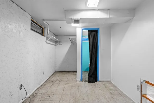 a view of a hallway with closet