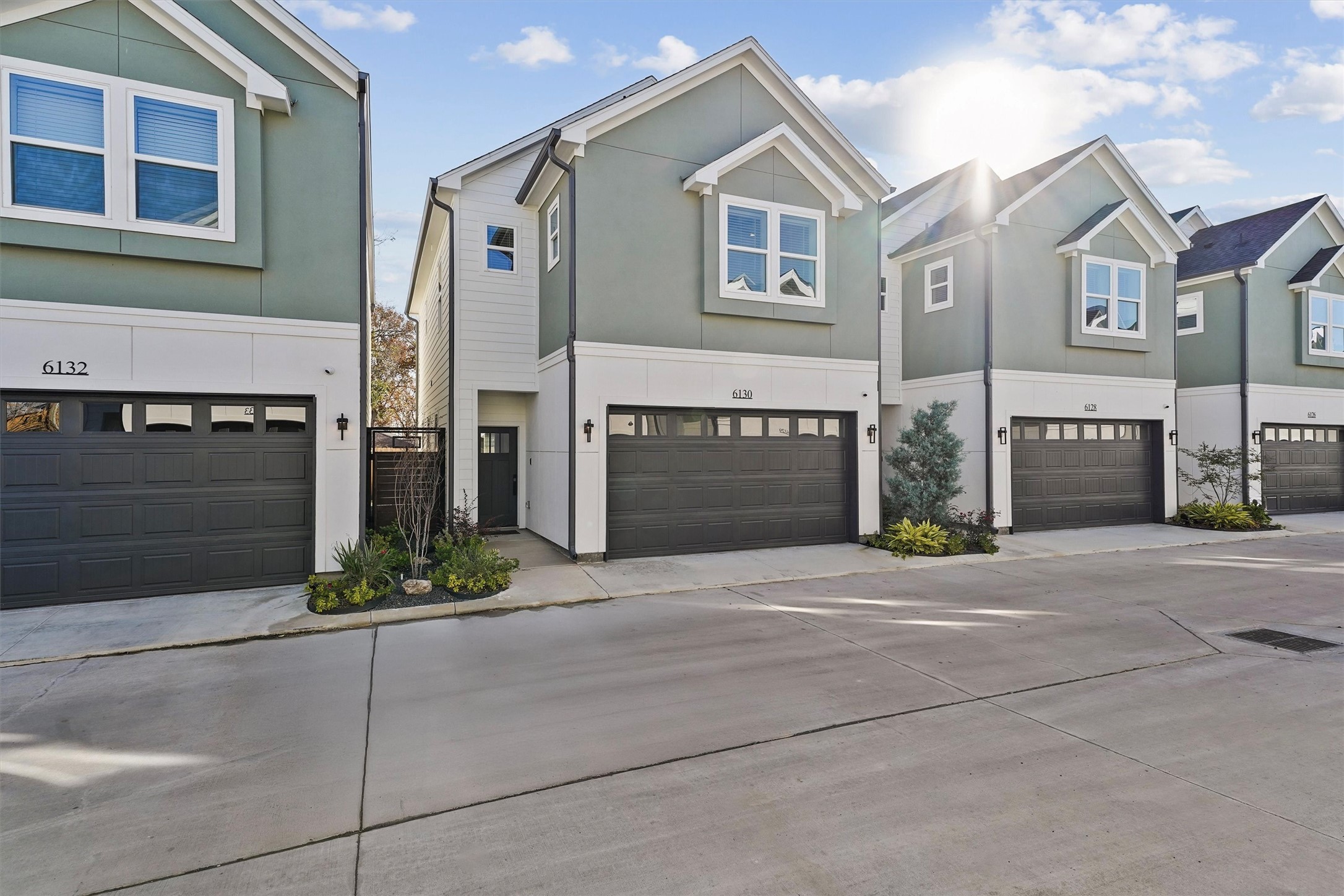 a front view of a house with yard