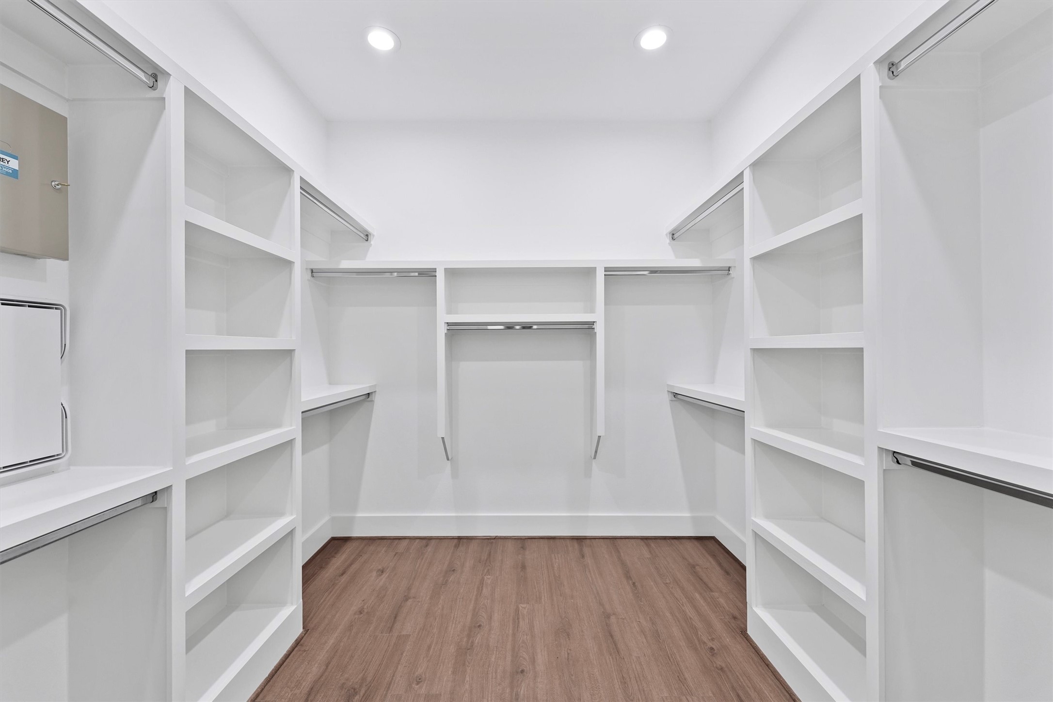 6130 Endeavor Heights Road Houston, TX 77091 - Photo 17 of 33 a view of walk in closet with empty racks