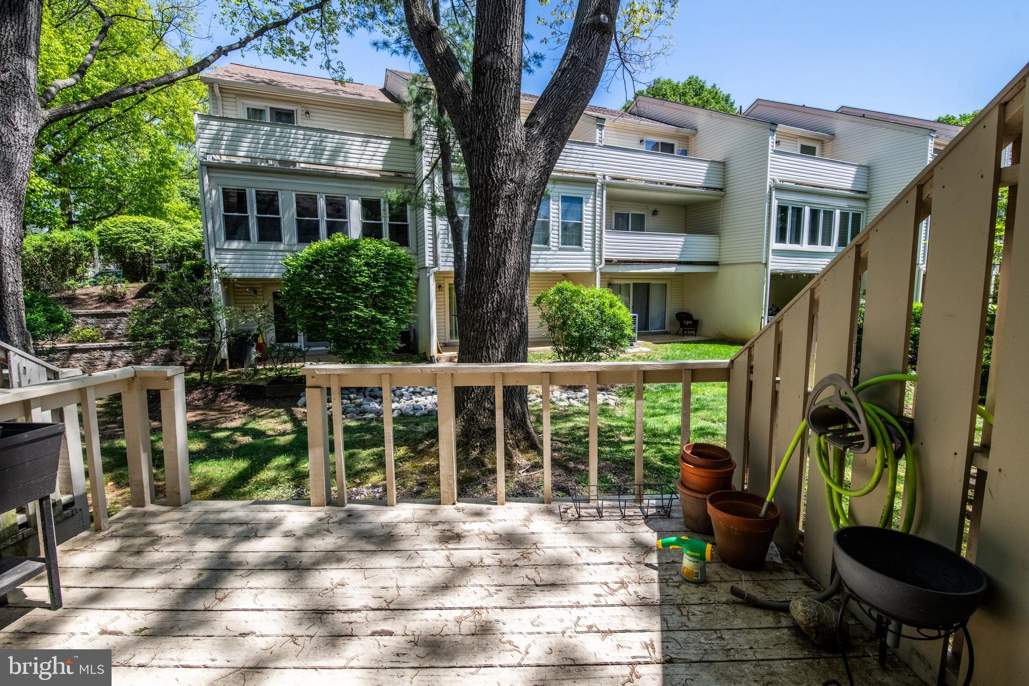 1197 Heyward Road, Unit 35 Chesterbrook, PA 19087 - Photo 16 of 44 a view of house with backyard outdoor seating and plants