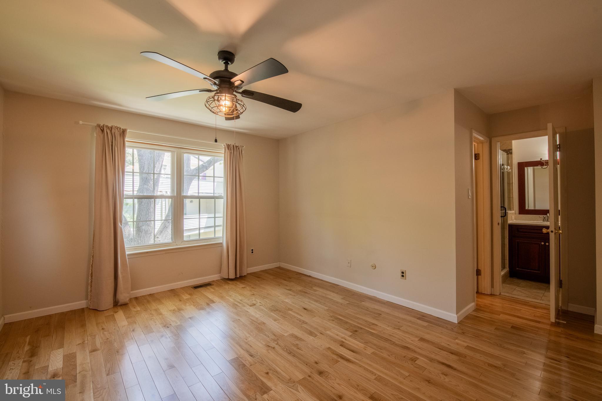 1197 Heyward Road, Unit 35 Chesterbrook, PA 19087 - Photo 19 of 44 wooden floor in an empty room with a window
