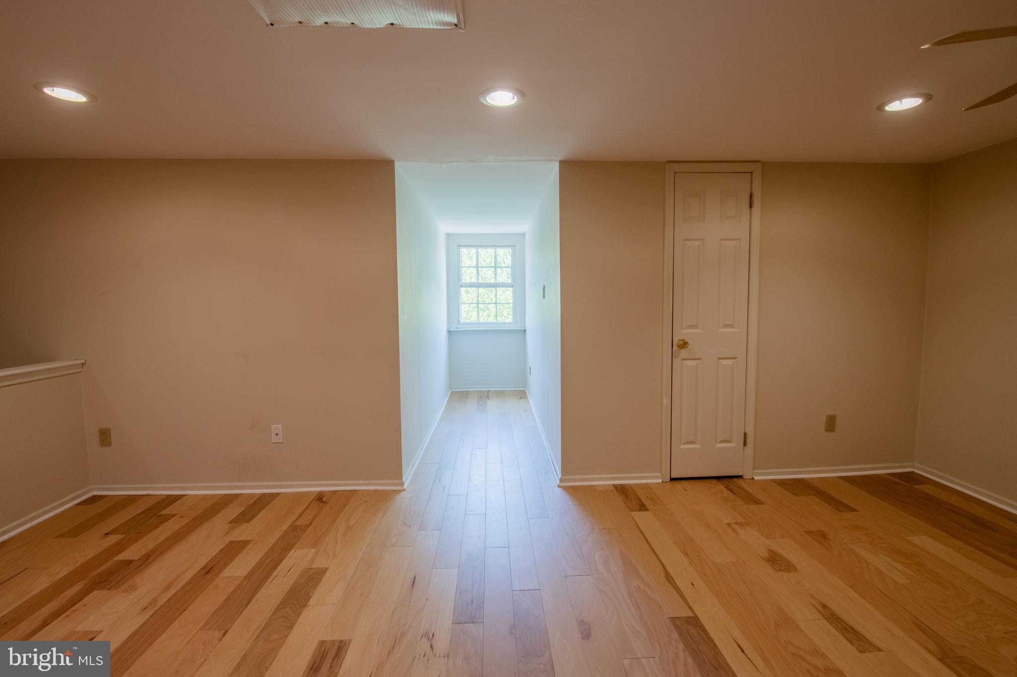 1197 Heyward Road, Unit 35 Chesterbrook, PA 19087 - Photo 32 of 44 a view of an empty room with wooden floor and closet