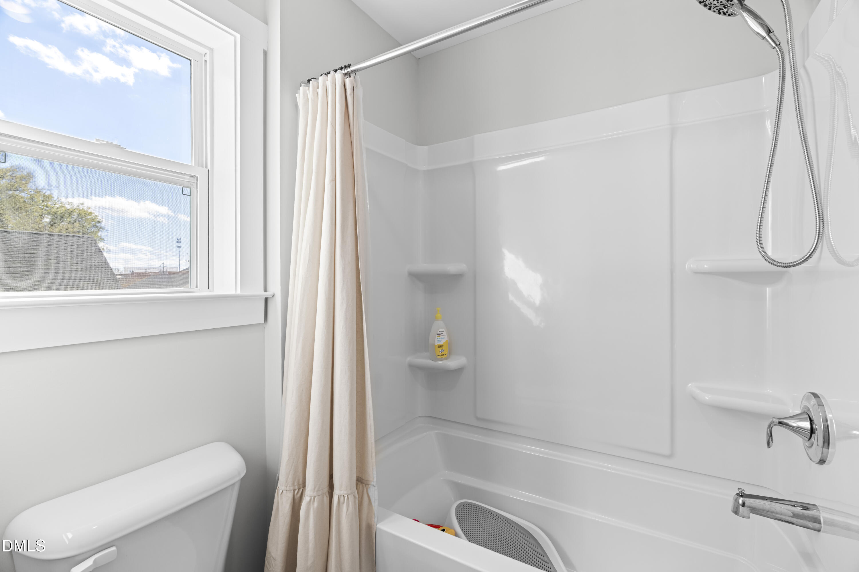 108 Bridge Street Smithfield, NC 27577 - Photo 33 of 48 a bathroom with a toilet and a shower