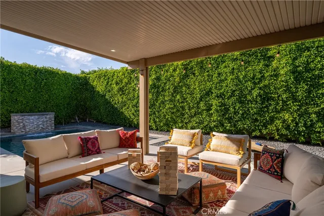 a room with furniture and a flat screen tv