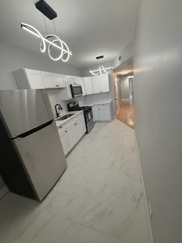 a upper view of a kitchen with a sink