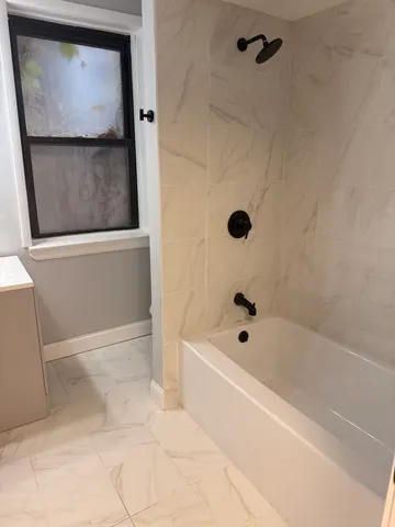 a bathroom with a bathtub