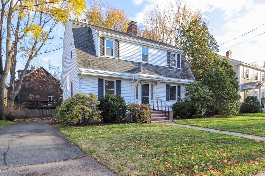 122 Albemarle Road Newton, MA 02460 - Photo 1 of 28 a front view of a house with garden