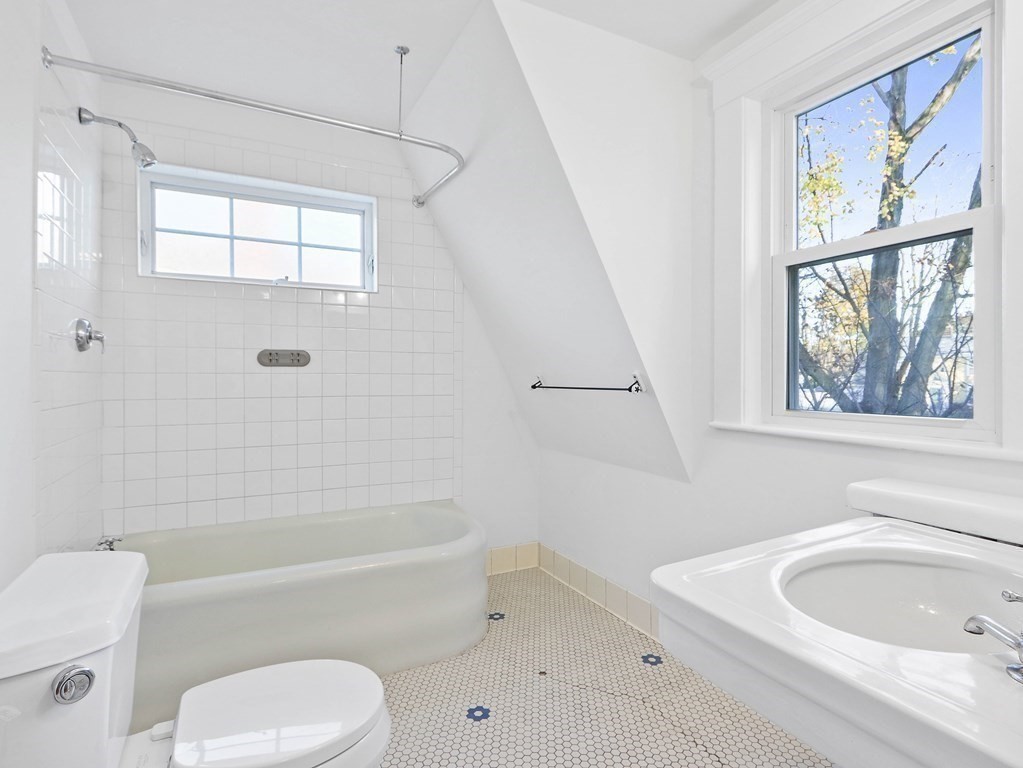122 Albemarle Road Newton, MA 02460 - Photo 19 of 28 a bathroom with a toilet a sink and a bathtub
