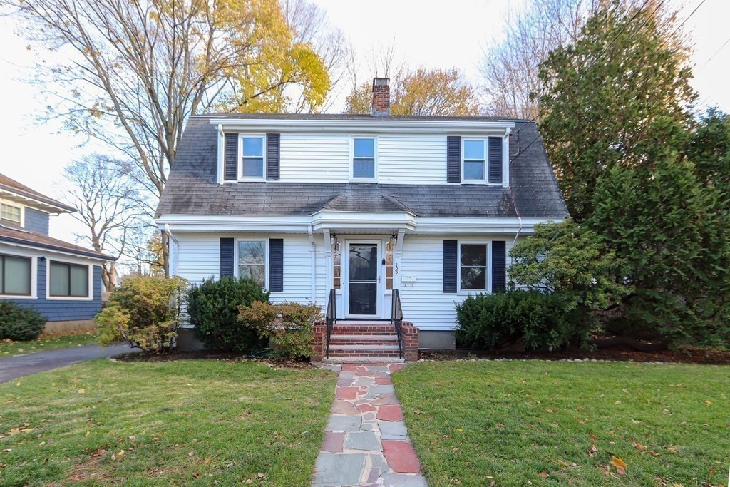 122 Albemarle Road Newton, MA 02460 - Photo 25 of 28 a front view of a house with garden