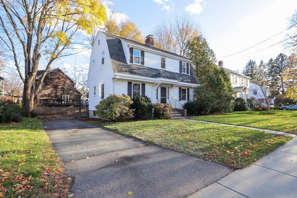 122 Albemarle Road Newton, MA 02460 - Photo 27 of 28 a front view of a house with garden