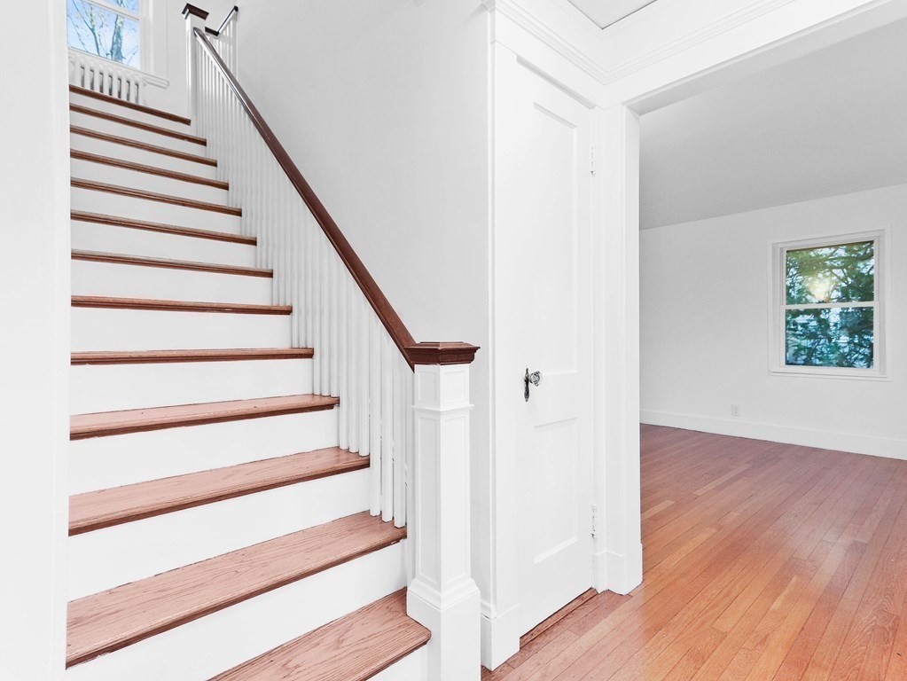 122 Albemarle Road Newton, MA 02460 - Photo 3 of 28 a view of entryway with wooden floor