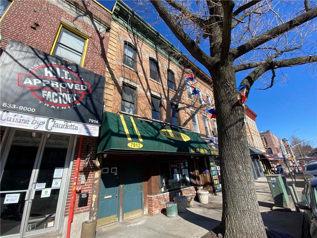 7912 3rd Avenue Brooklyn, NY 11209 - Photo 2 of 18 a view of street with sitting area