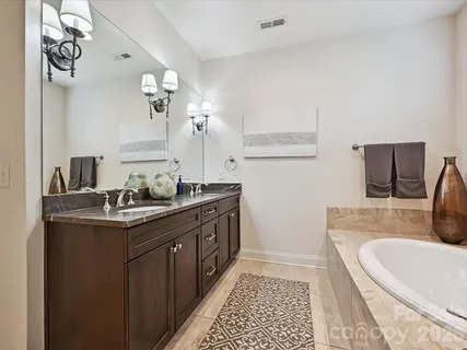 a kitchen with a sink and a refrigerator