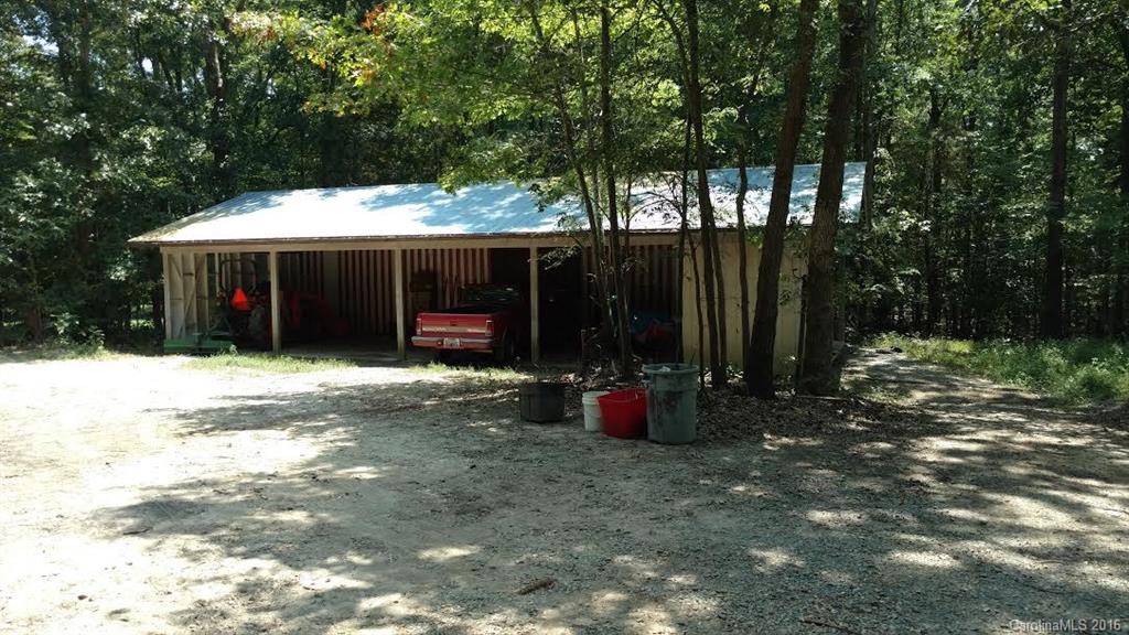 5011 Addison Road Waxhaw, NC 28173 - Photo 20 of 23 a view of outdoor space with deck and tree