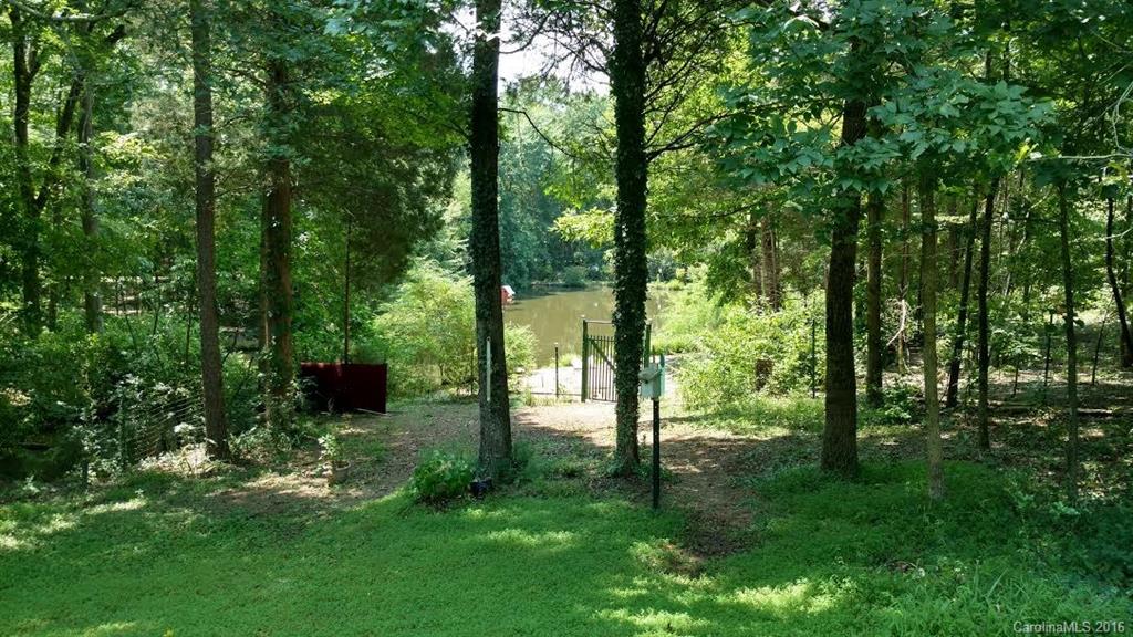 5011 Addison Road Waxhaw, NC 28173 - Photo 23 of 23 a backyard of a house with table and chairs