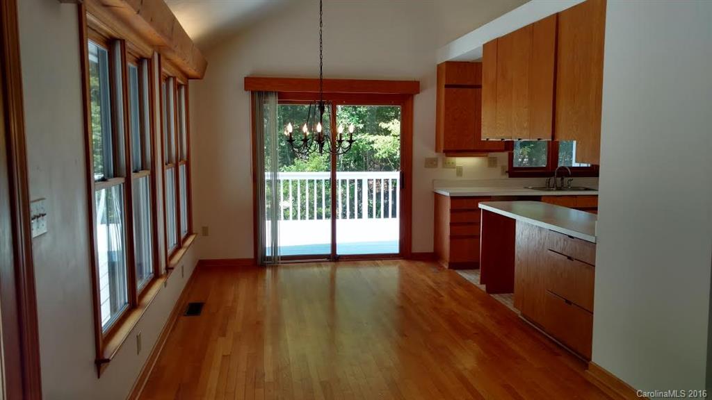 5011 Addison Road Waxhaw, NC 28173 - Photo 4 of 23 a kitchen with wooden floors and sink
