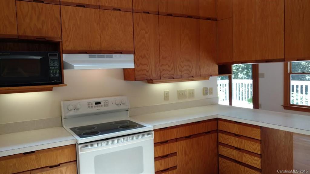 5011 Addison Road Waxhaw, NC 28173 - Photo 5 of 23 a kitchen with a sink and cabinets