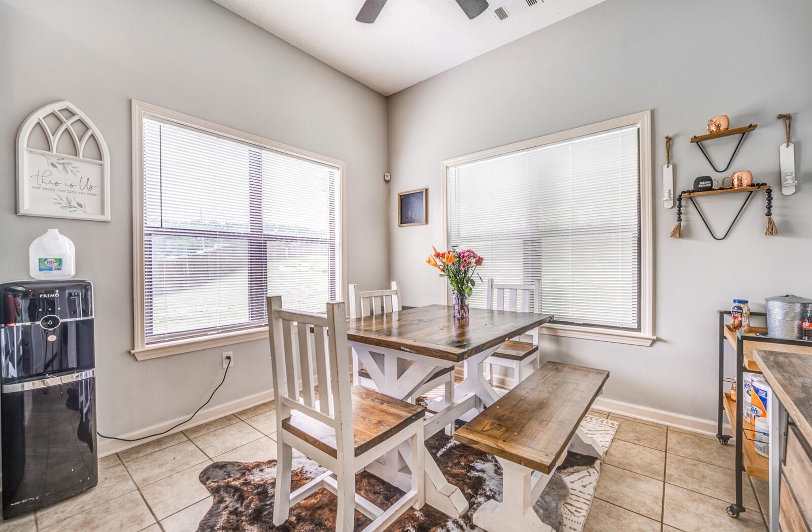 4671 Hampton Ridge Lane Bartlett, TN 38002 - Photo 15 of 40 Dining area featuring a vaulted ceiling and tile flooring
