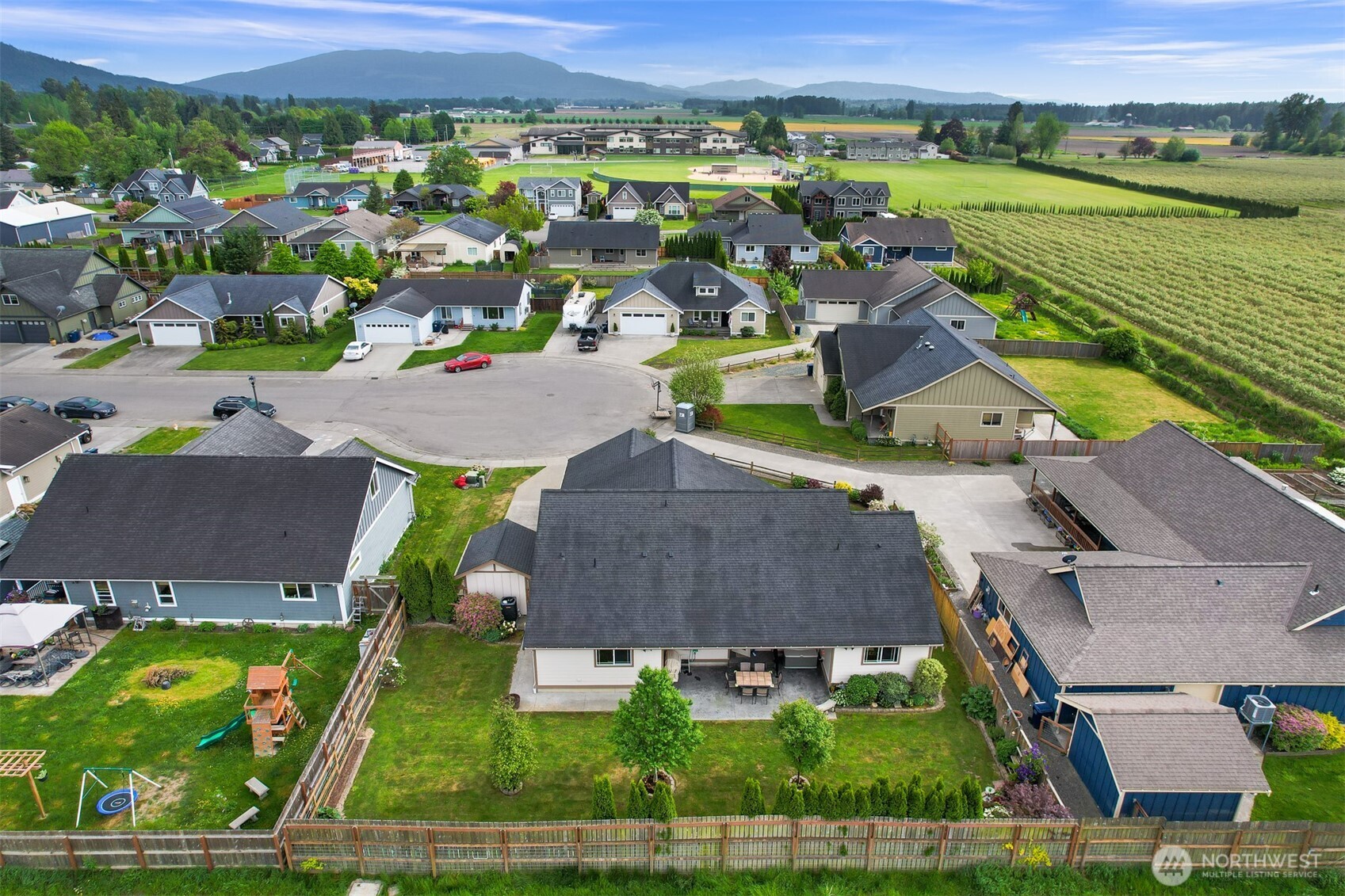 502 Westview Place Nooksack, WA 98276 - Photo 28 of 30 an aerial view of residential houses with outdoor space and river