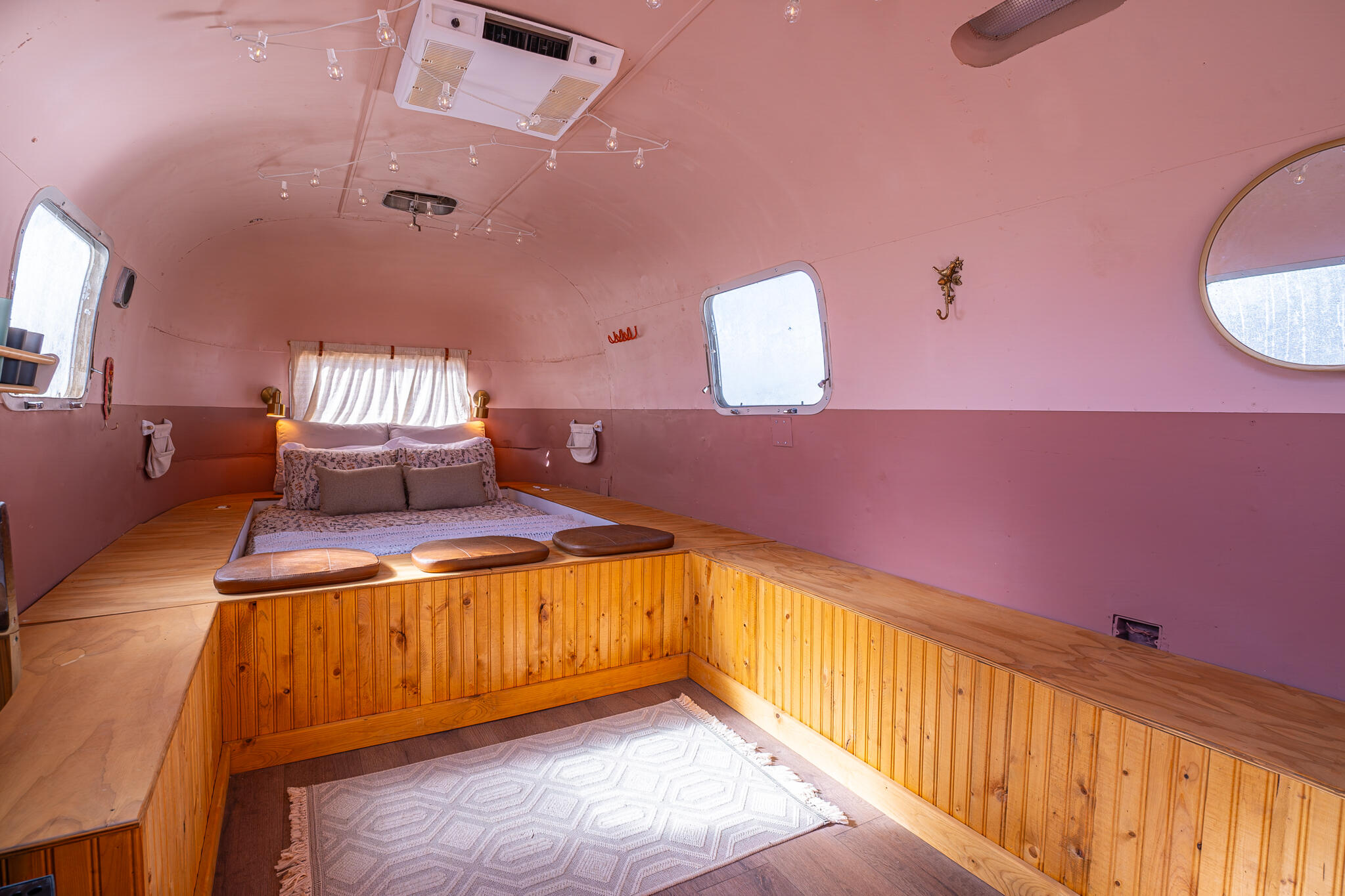 5177 Roy Rogers Road Pioneertown, CA 92268 - Photo 44 of 46 a bedroom with a bed and wooden floor