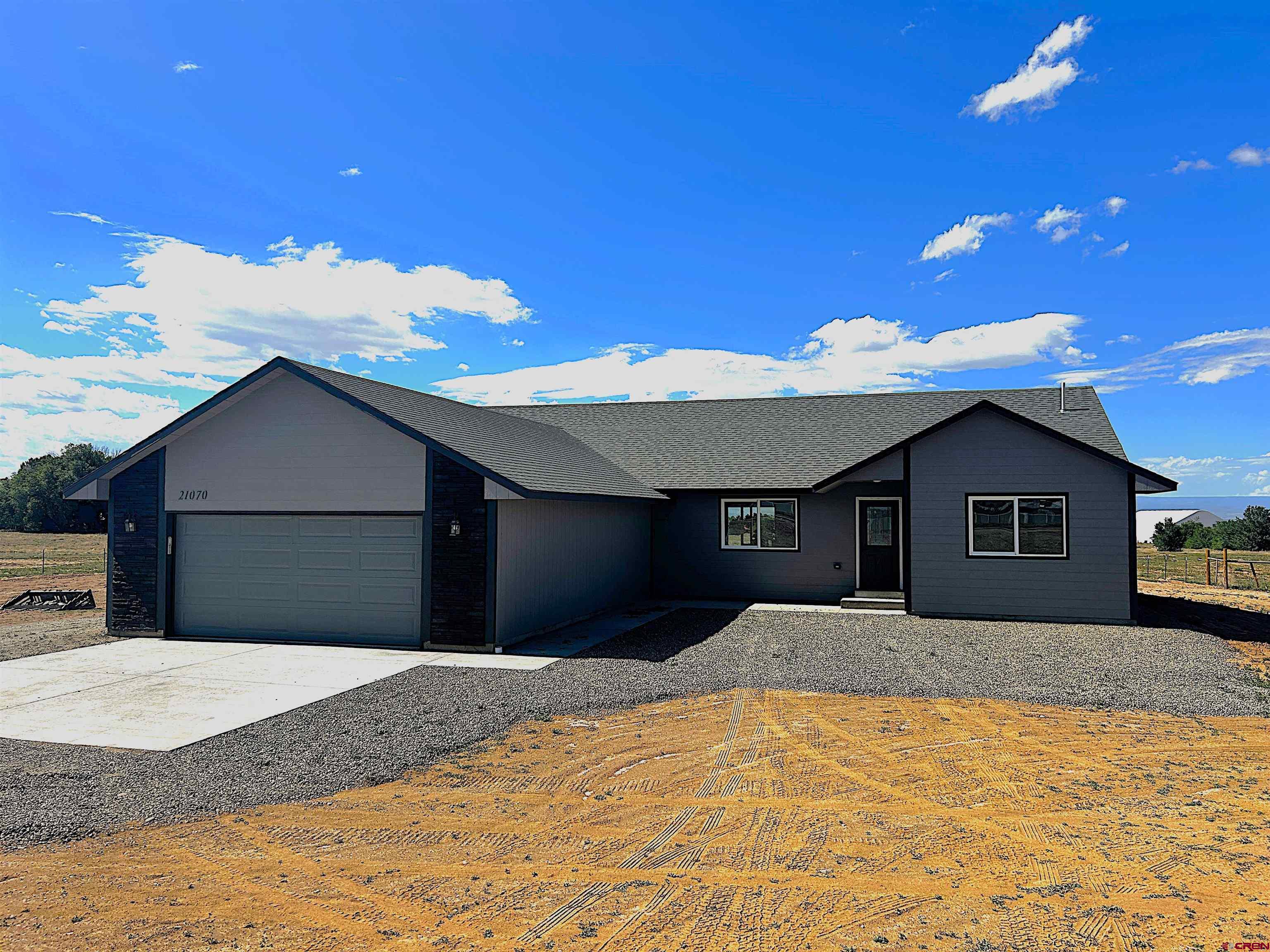 a house view with a backyard space