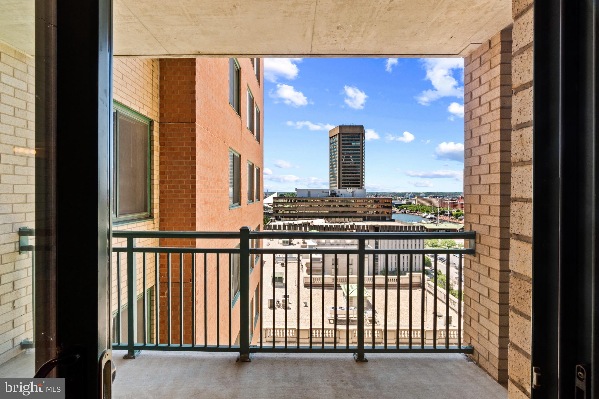 414 Water Street, Unit 1315 Baltimore, MD 21202 - Photo 27 of 30 a view of balcony with furniture