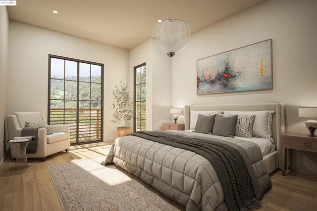 a spacious bedroom with a large bed and a couch