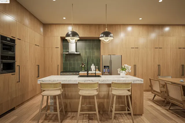a dining room with a table and chairs