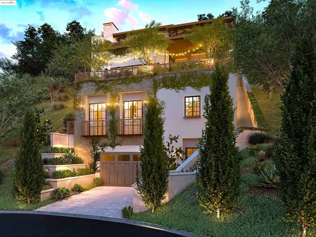 a view of a house with a yard and potted plants
