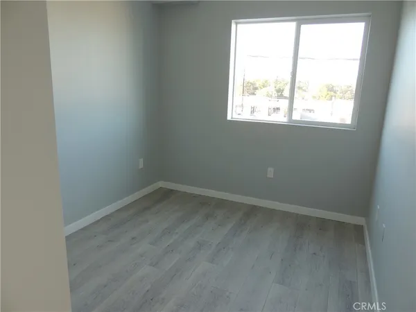 a bathroom with a shower and a toilet