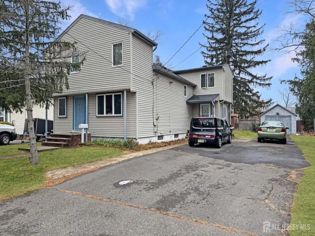 a car parked in front of a house