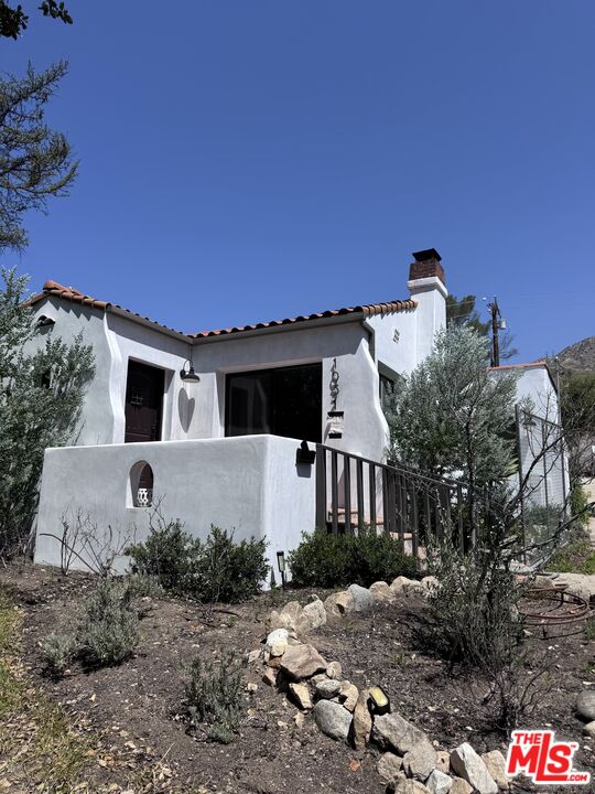 1031 Wapello Street Altadena, CA 91001 - Photo 1 of 1 a view of a house with a yard