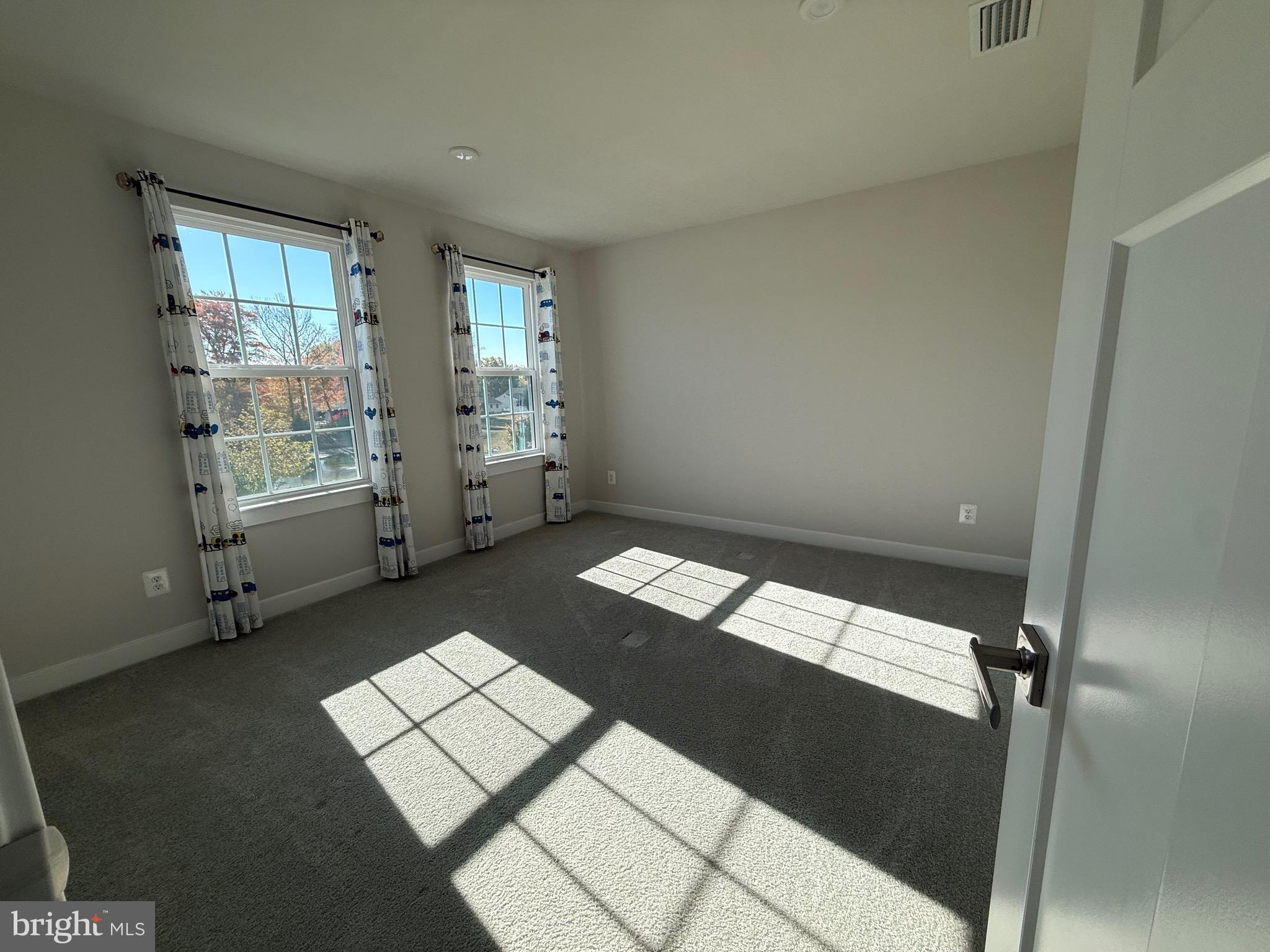 440 Tree Of Heaven Way Newark, DE 19713 - Photo 11 of 27 a view of an empty room with a window
