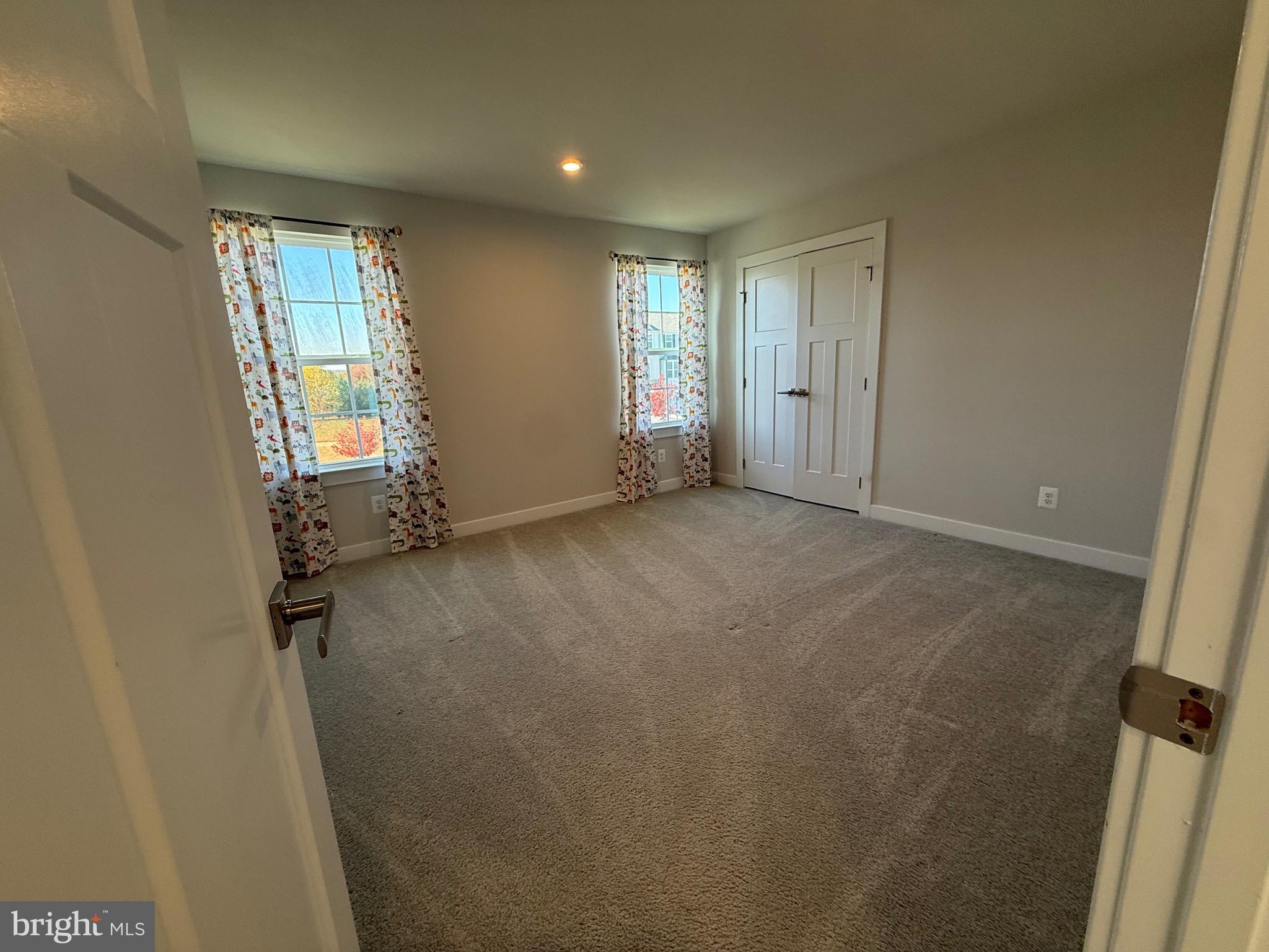 440 Tree Of Heaven Way Newark, DE 19713 - Photo 15 of 27 a view of an empty room with a window