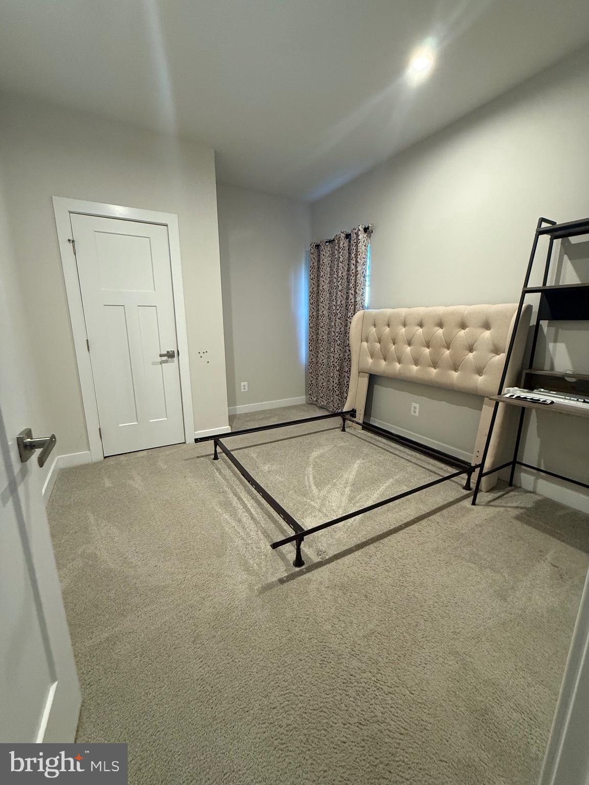 440 Tree Of Heaven Way Newark, DE 19713 - Photo 20 of 27 a bedroom with a bed and gym equipment