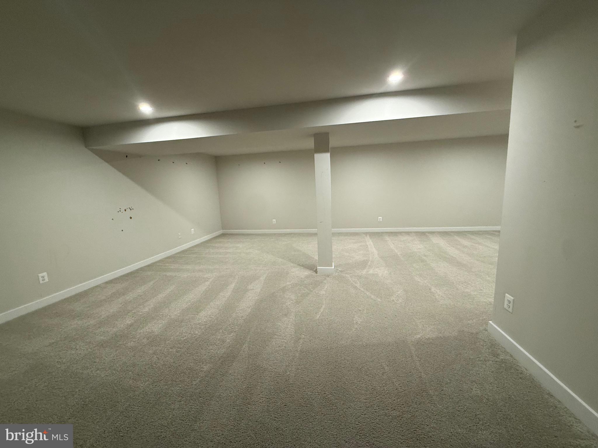 440 Tree Of Heaven Way Newark, DE 19713 - Photo 25 of 27 an empty room with a natural light