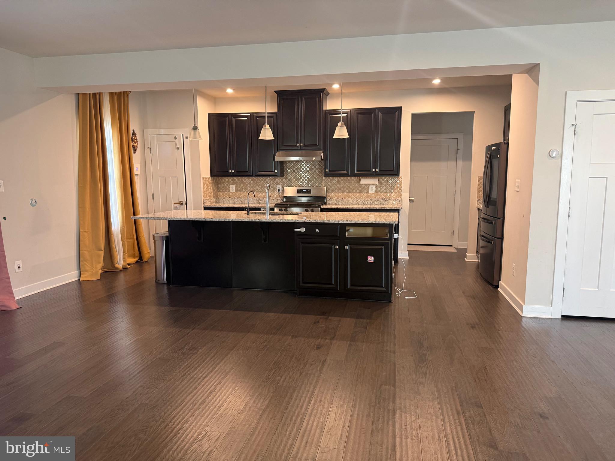 440 Tree Of Heaven Way Newark, DE 19713 - Photo 4 of 27 a view of kitchen with sink and wooden floor
