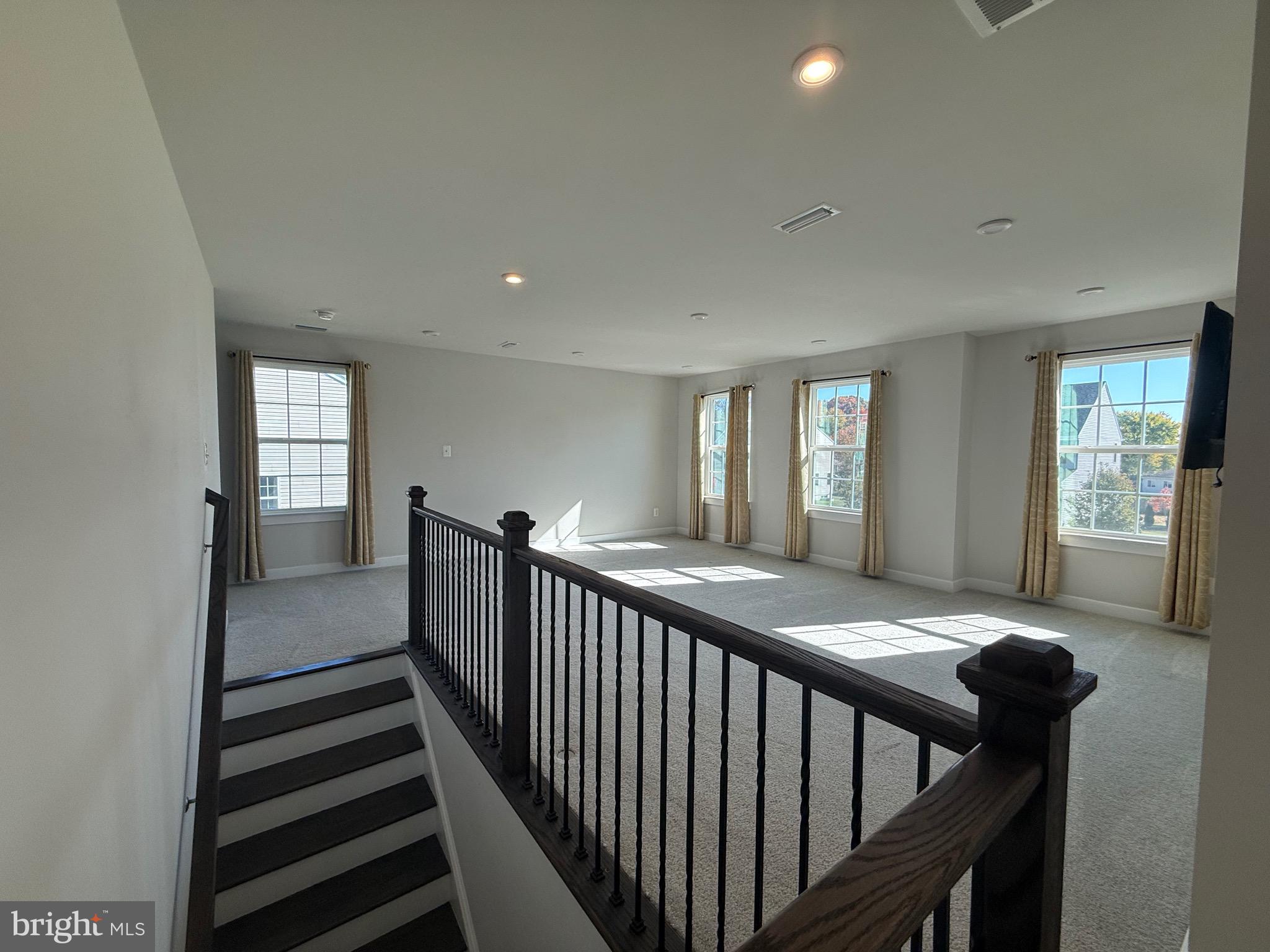 440 Tree Of Heaven Way Newark, DE 19713 - Photo 8 of 27 a view of a hallway with windows
