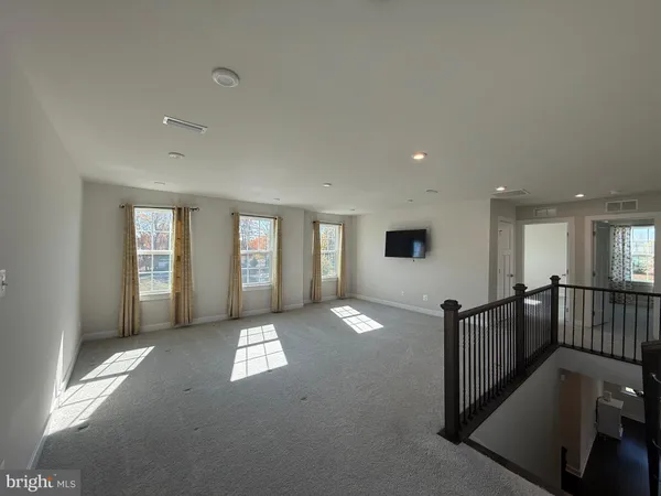 a view of gallery with windows