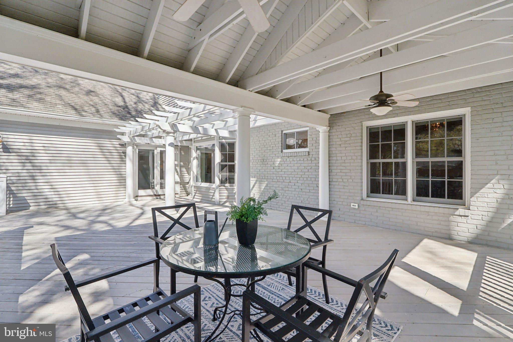 5602 Ogden Road Bethesda, MD 20816 - Photo 35 of 87 The covered deck overlooks the backyard.