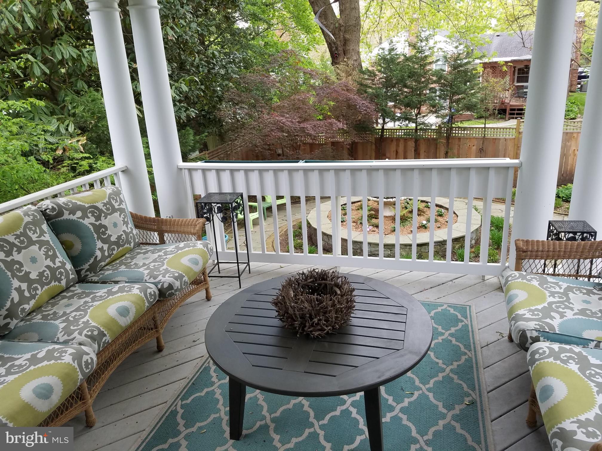 5602 Ogden Road Bethesda, MD 20816 - Photo 5 of 87 Charming porch with serene garden view.