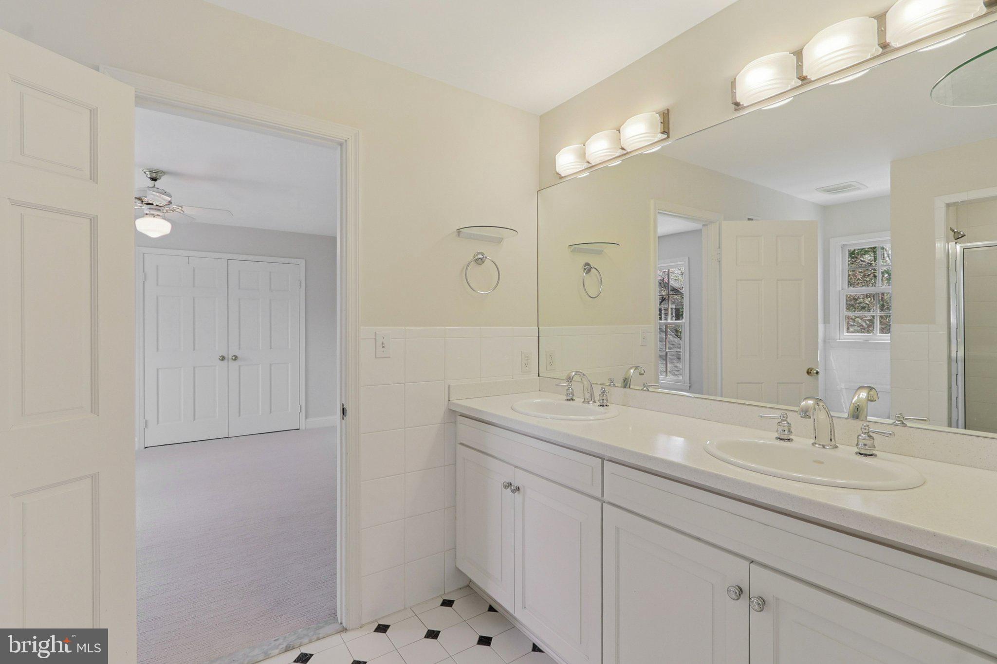 5602 Ogden Road Bethesda, MD 20816 - Photo 58 of 87 Jack and Jill bath adjoins BRs 3 and 4.